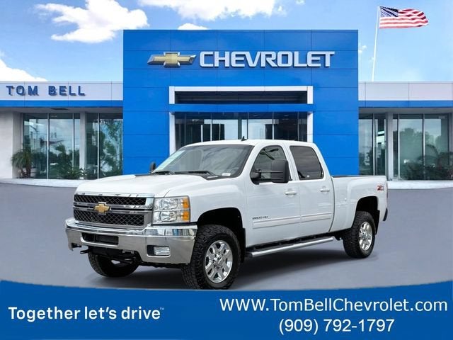 2011 Chevrolet Silverado 2500 HD LTZ in Summit White — front three-quarter view
